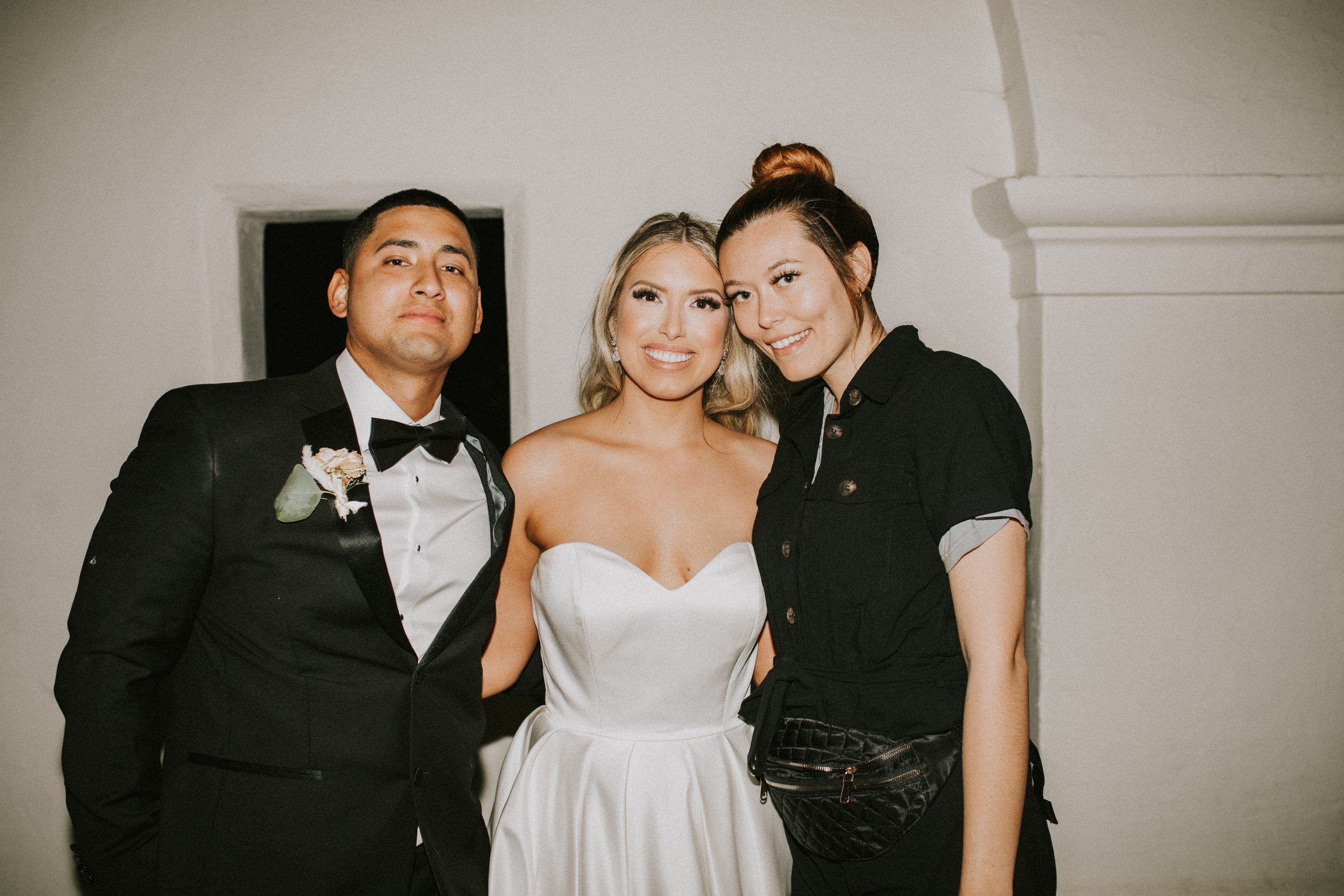 Bride and Groom with their Wedding Photographer