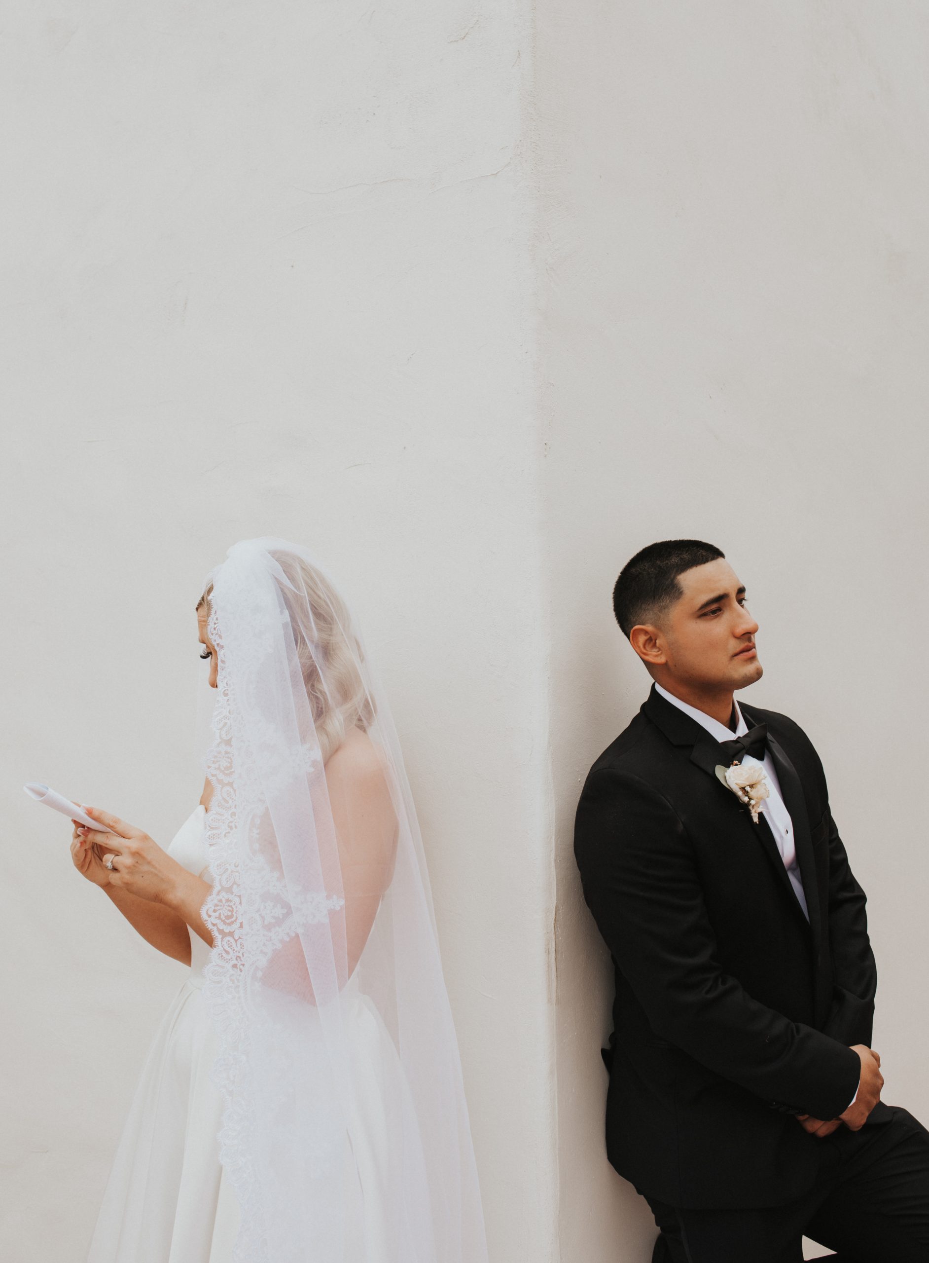 Junipero Serra Wedding | San Diego, CA Bride reads vows to groom before first look